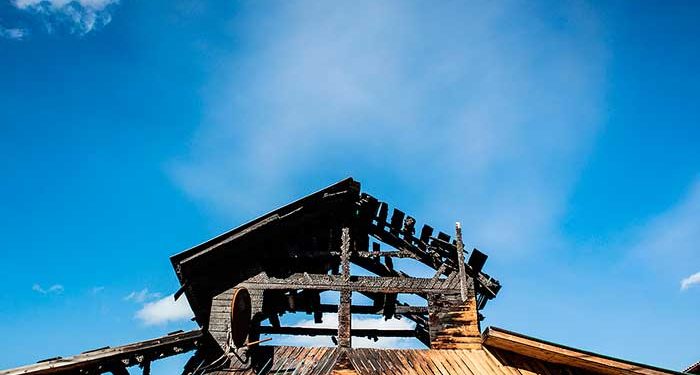 Properties Destroyed as Stubborn Wildfires rage in California; Firefighter Dies